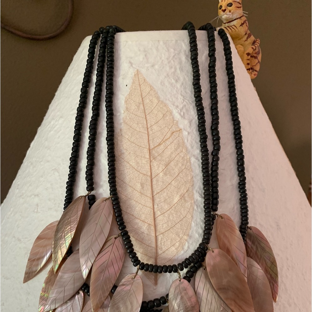 Vintage carved shell and black bead necklace.